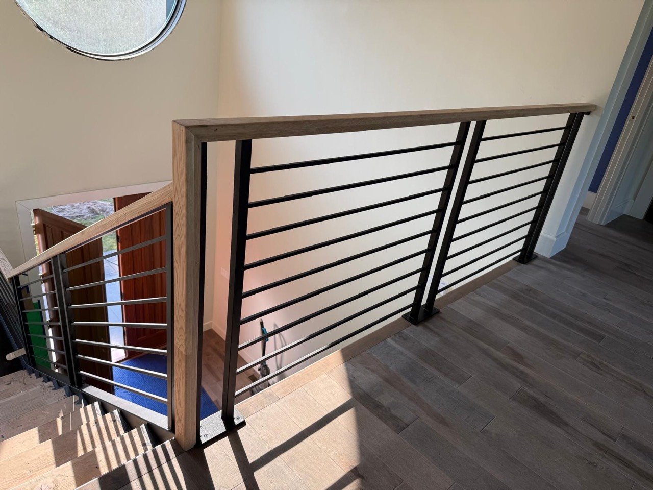 Interior steel railing with horizontal bars